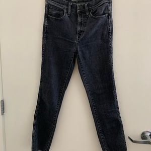 Madewell faded black denim jeans with frayed hem